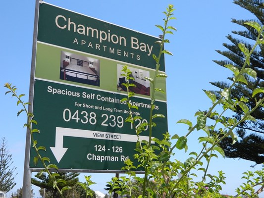 Champion Bay Apartments - Entry sign on Chapman Rd